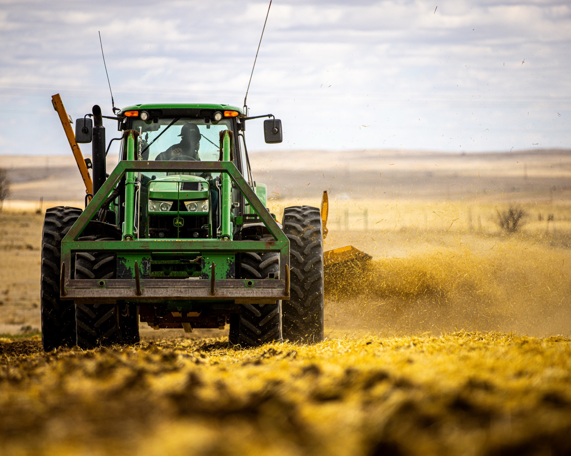 John Deere tractor working reclamation site in the Powder River Basin